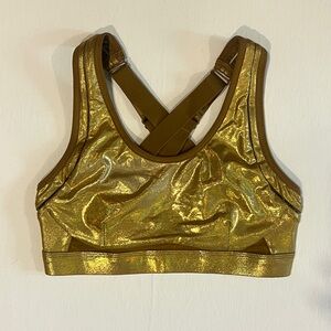 Fabletics Metallic Gold Sports Bra with Mesh details and adjustable straps.
